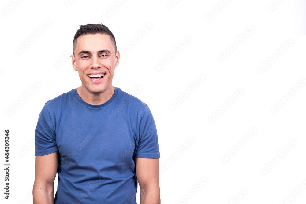 Portrait of a man smiling relaxed while facing the camera Portrait of a man smiling relaxed while facing the camera