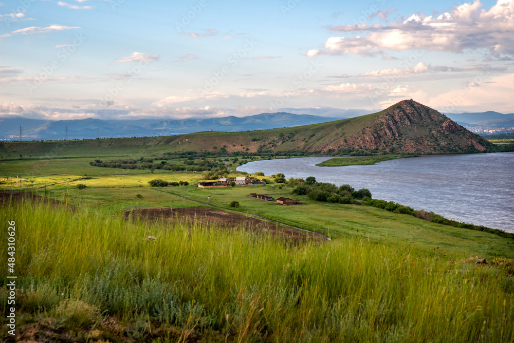 Selenga river with a hill in the suburb of Ulan-Ude in summer