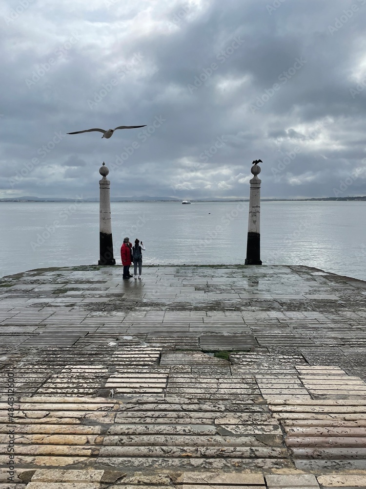 Lisboa pier on Tago river with seagull. Lisbon, Portugal