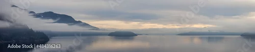 Obraz Scenic Canadian Nature View on the Pacific West Coast during cloudy and foggy winter day. Howe Sound, between Vancouver and Squamish, British Columbia, Canada.
