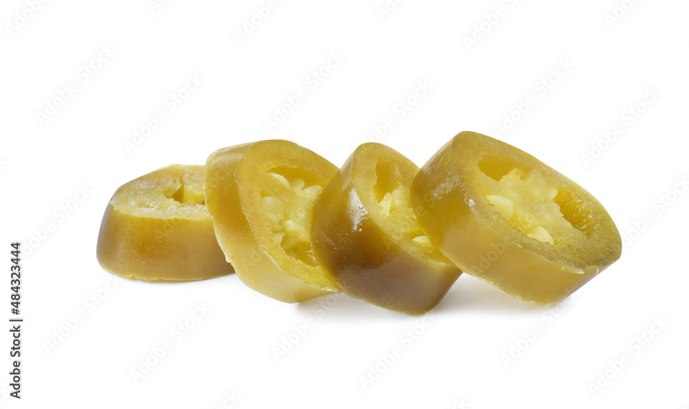 Slices of pickled green jalapeno on white background Slices of pickled green jalapeno on white background
