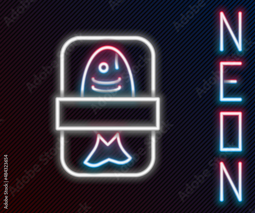 Glowing neon line Fish plastic tray container with cellophane cover icon isolated on black background. Colorful outline concept. Vector