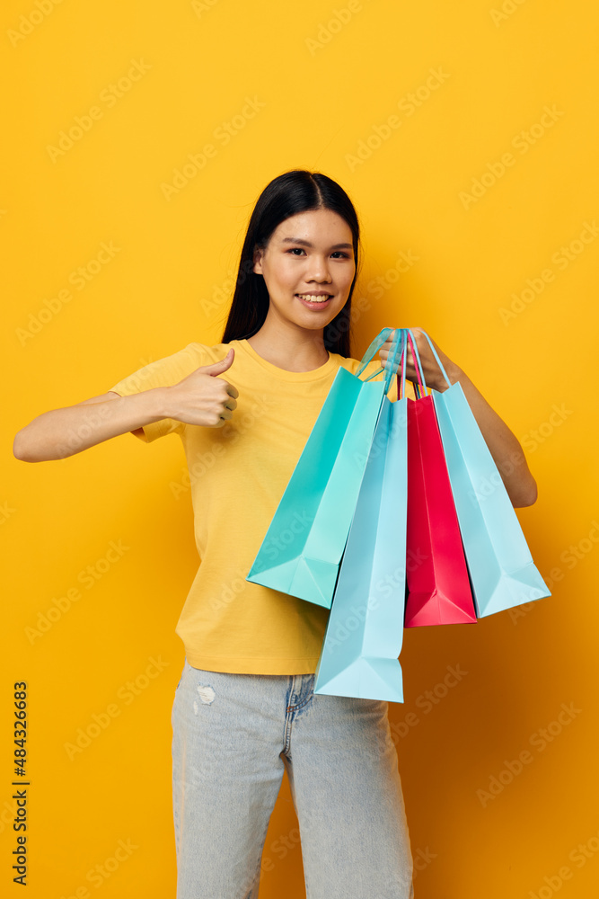 Portrait Asian beautiful young woman fashion shopping posing isolated background unaltered