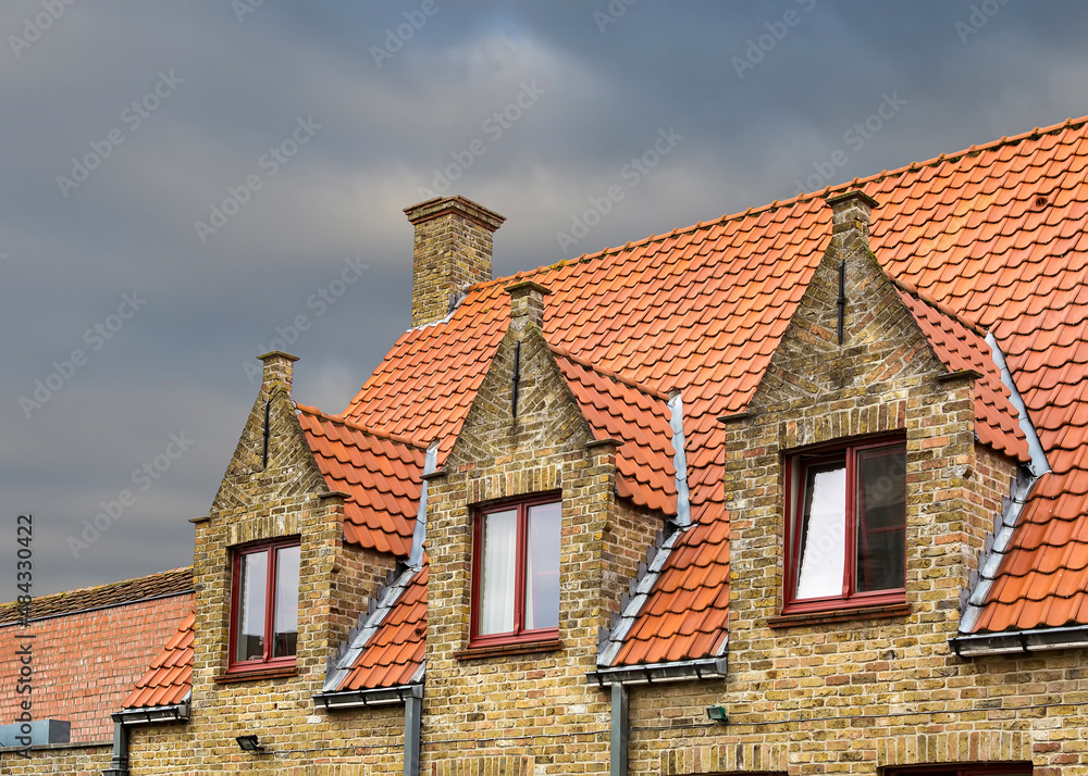 Old house dormer windows in Damme, A municipality located in the Belgian province of West Flanders, Belgium Old house dormer windows in Damme, A municipality located in the Belgian province of West Flanders, Belgium