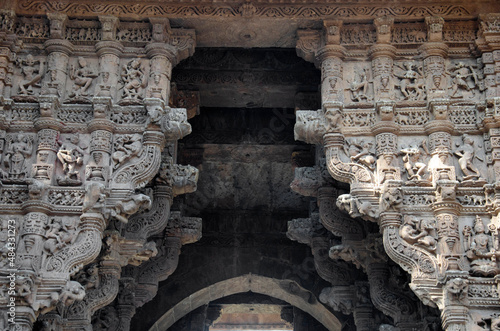 Carved idols on the Vadodara Bhagol also known as the Western gate, located in Dabhoi, Gujarat, India photo