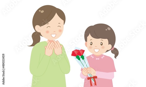 母の日にママへカーネーションを贈る女の子