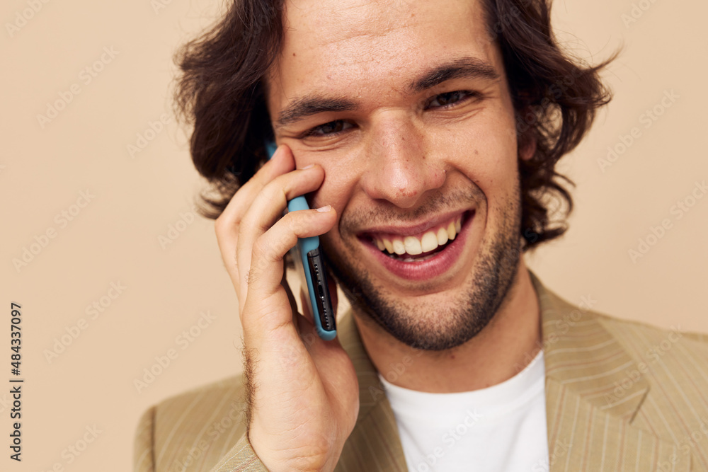 handsome man talking on the phone technologies Lifestyle unaltered handsome man talking on the phone technologies Lifestyle unaltered