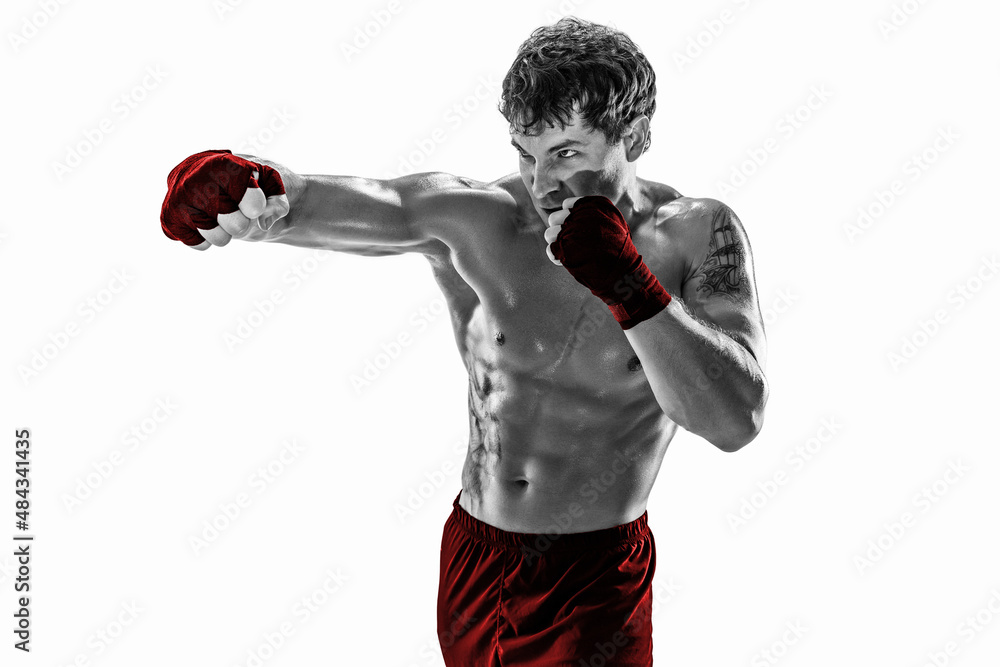 Studio shot of silhouette boxer who training, practicing jab on white background. Red sportswear.  - obrazy, fototapety, plakaty 