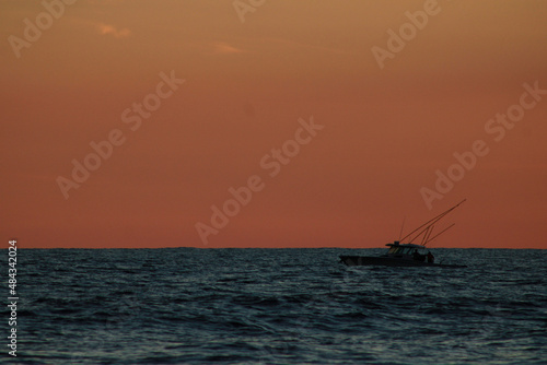 fishing boat at sunset © lvaro