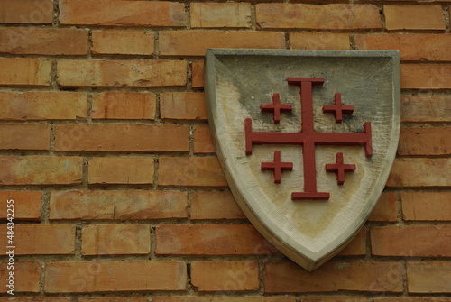 Manoppello - Abruzzo - Abbey of Santa Maria d'Arabona - Stone shield representing the coat of arms of the Equestrian Order of the Holy Sepulcher of Jerusalem.