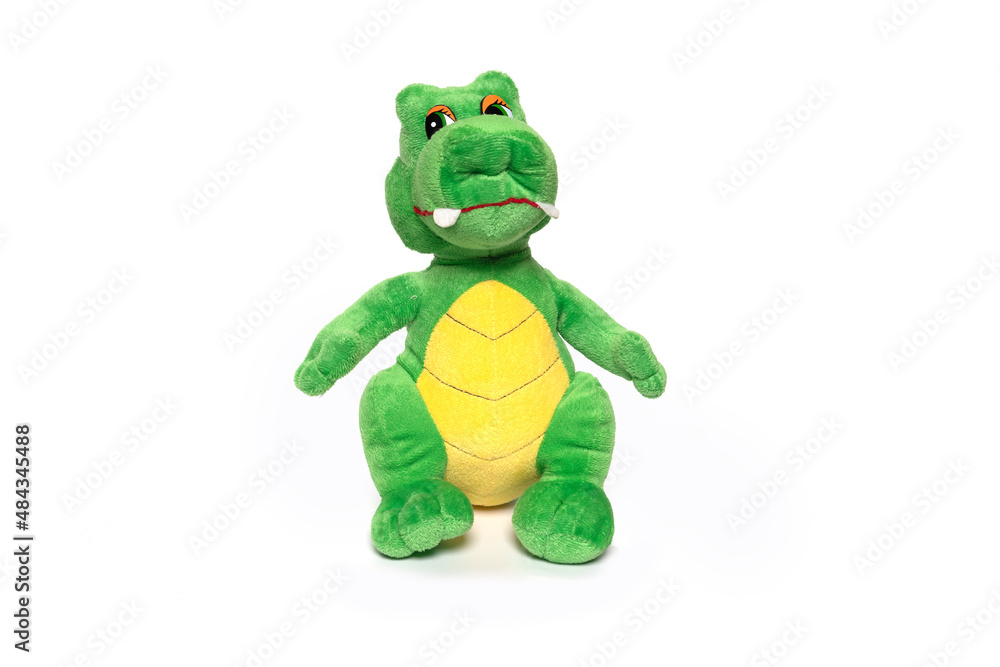 Obraz premium Soft toy dragon isolated on white background.