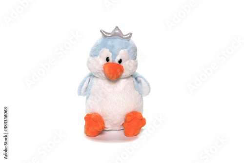 Blue plush penguin on white background.