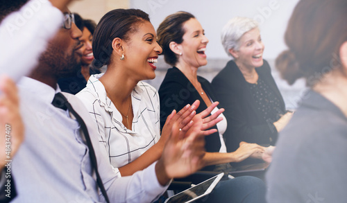 Applauding the best seminar lecturer. Cropped shot of a diverse group of businesspeople sitting and clapping while in the office during the day.