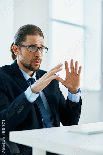 business man wearing glasses work desk computer office manager