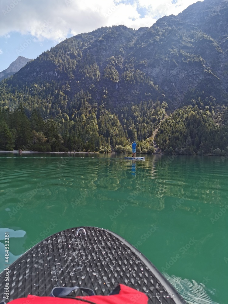 Sup board on the Lake Plansee, Tyrol, Austria
