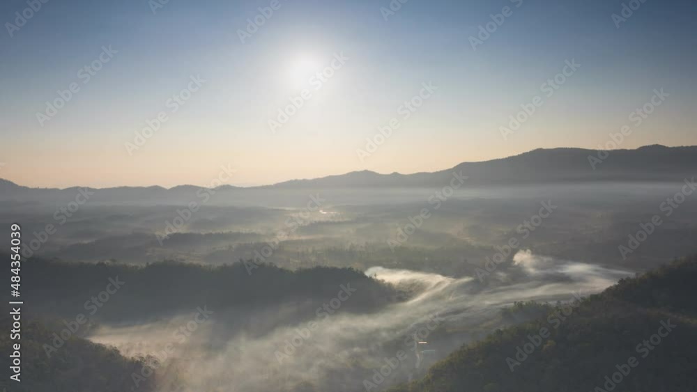 Hyper lapse video 4k motion, Aerial view Beautiful of morning scenery Golden light sunrise And the mist flows on high mountains. Pang Puai, Mae Moh, Lampang, Thailand. Hyper lapse video 4k motion, Aerial view Beautiful of morning scenery Golden light sunrise And the mist flows on high mountains. Pang Puai, Mae Moh, Lampang, Thailand.