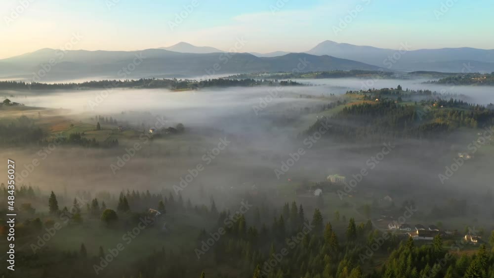 Drone flies over a spectacular mountain valley at sunrise. Filmed in 4k, drone video. Drone flies over a spectacular mountain valley at sunrise. Filmed in 4k, drone video.