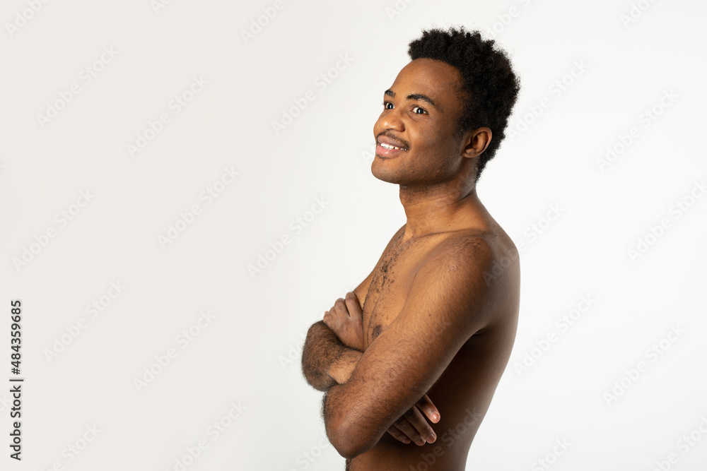 Obraz premium Portrait of a cheerful African man on a white background 