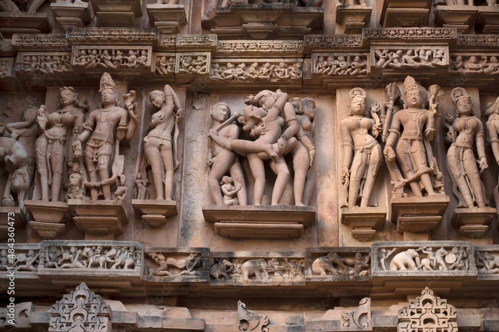 LAKSHMANA TEMPLE: Erotic sculpture at wall. Western Group, Khajuraho, Madhya Pradesh, India