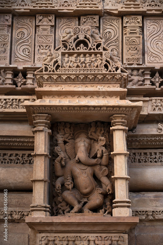 LAKSHMANA TEMPLE: Standing Ganesha Sculpture.Western Group, Khajuraho, Madhya Pradesh, India