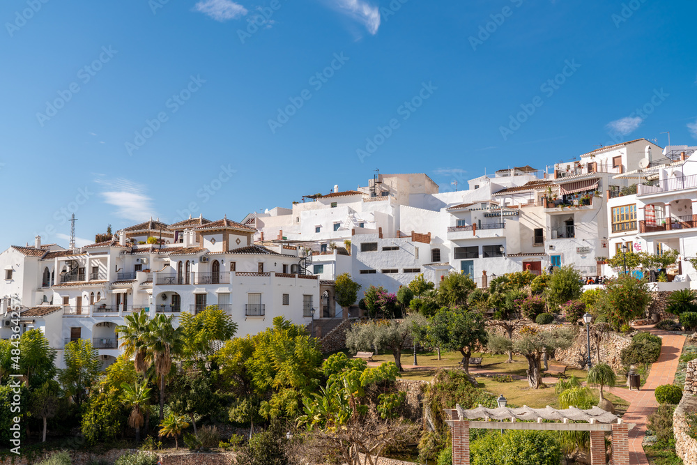 FRIGILIANA, SPAIN - January 28 2022: Situated in South of Spain, Frigiliana is a touristic travel destination, a village situated on the hills, with white houses, small roads. Typically Andalusian 