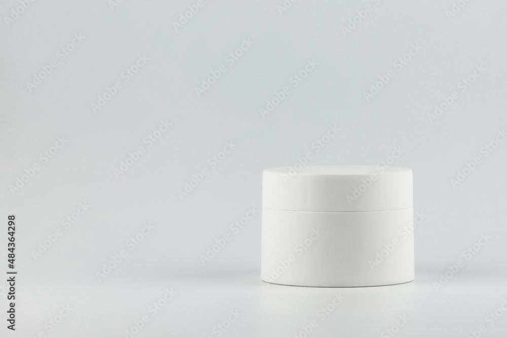 Skincare and cosmetology mockup with copy space. Unbranded plastic jar for cosmetics products. Branding identity template for text and design Skincare and cosmetology mockup with copy space. Unbranded plastic jar for cosmetics products. Branding identity template for text and design