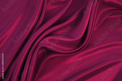 Obraz na płótnie Beautiful elegant wavy dark fuchsia pink satin silk luxury cloth fabric texture with monochrome background design
