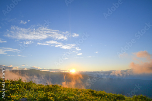 The sunrise shines with cloud and mist in mountains of Nagano in summer Japan.