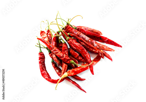 Isolated asian dry red chillies pepper on a white background	