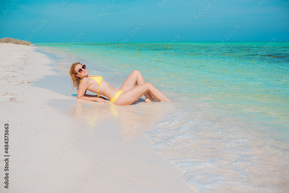 Vacation scene. Panoramic views of blue sea and coastline. Beautiful landscape, aerial view, Egypt. Plus size woman enjoys view of coast of Red Sea. High quality photo