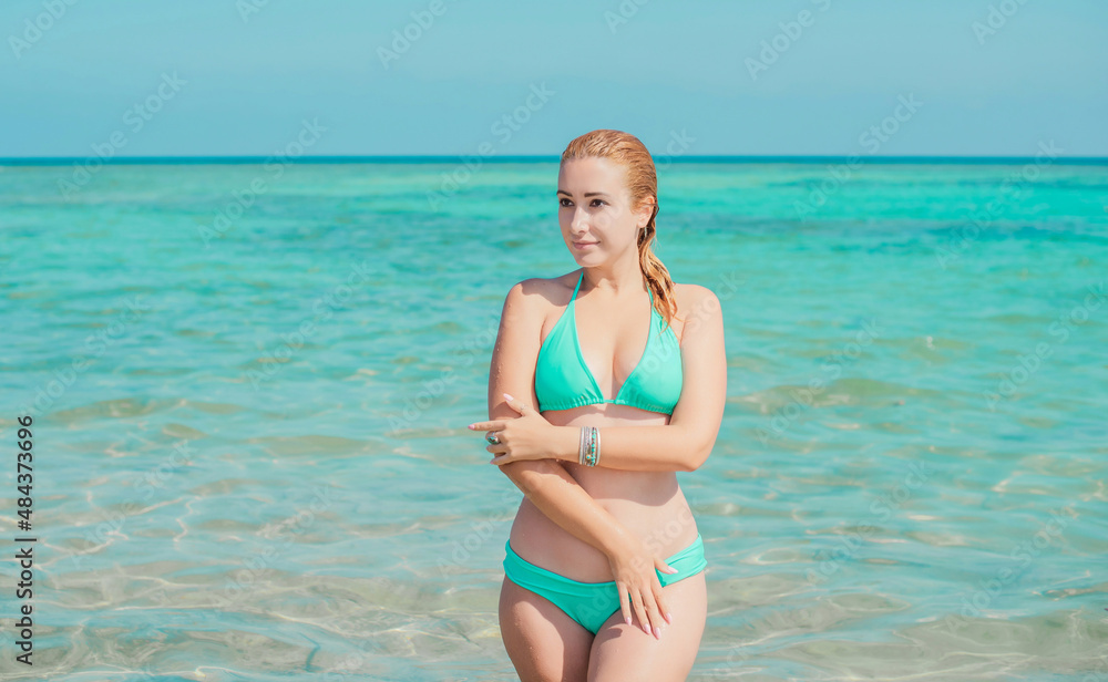 Vacation scene. Panoramic views of blue sea and coastline. Beautiful landscape, aerial view, Egypt. Plus size woman enjoys view of coast of Red Sea. High quality photo Vacation scene. Panoramic views of blue sea and coastline. Beautiful landscape, aerial view, Egypt. Plus size woman enjoys view of coast of Red Sea. High quality photo