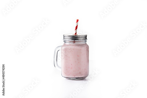 Fresh strawberry and banana smoothie in jar isolated on white background