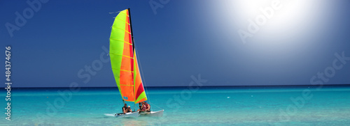 Sailboat catamaran on tourquise water of varadero cuba photo