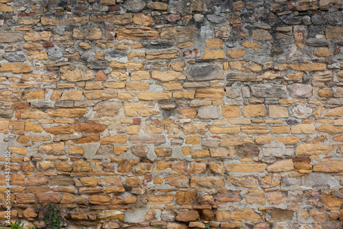 Fragment of ancient wall in Lyon, France as background