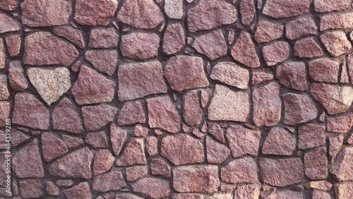 Stone masonry wall or fence. Buildings and architecture 