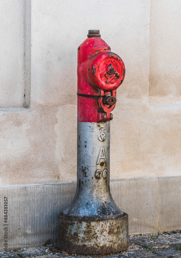 Old classical iron fire hydrant on a street corner. Old classical iron fire hydrant on a street corner.