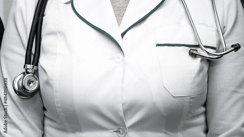 Abstract image of doctor with stratoscope and and big breasts in a white coat