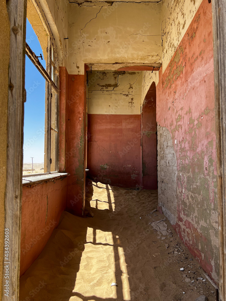 Abandoned city of Kolmanskop in Namibia. Ancient city, sand in desert of Africa. Abandoned city of Kolmanskop in Namibia. Ancient city, sand in desert of Africa.
