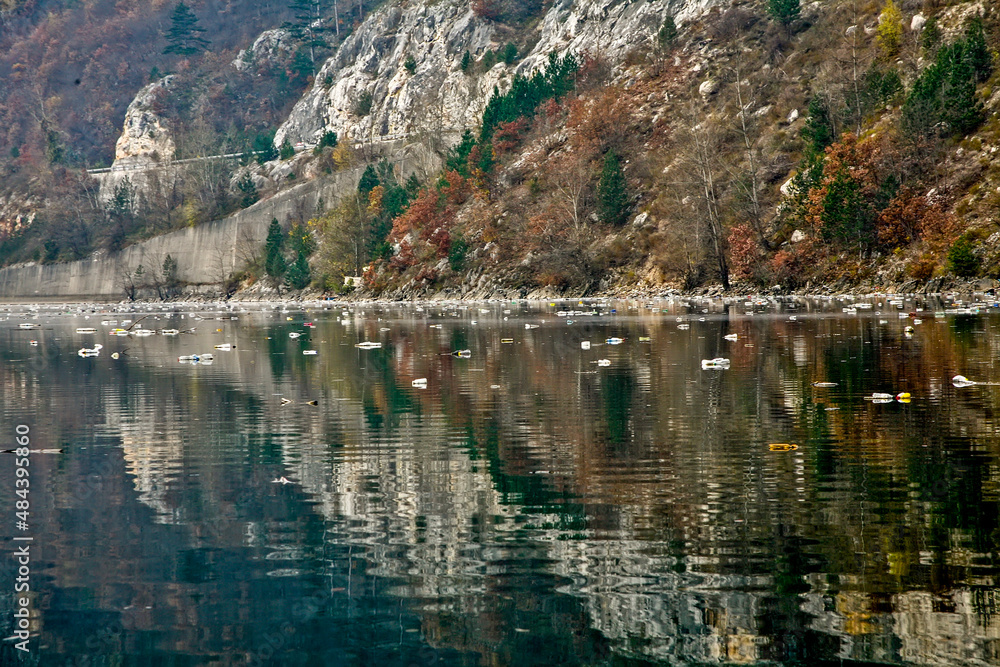 Pollution on the river with bottles Pollution on the river with bottles