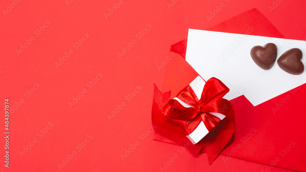 Valentines Day background with red chocolate hearts on color background. Happy Valentine Day Valentines Day background with red chocolate hearts on color background. Happy Valentine Day