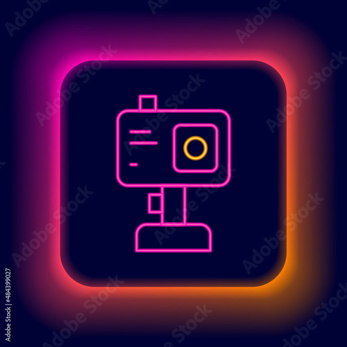 Glowing neon line Action extreme camera icon isolated on black background. Video camera equipment for filming extreme sports. Colorful outline concept. Vector
