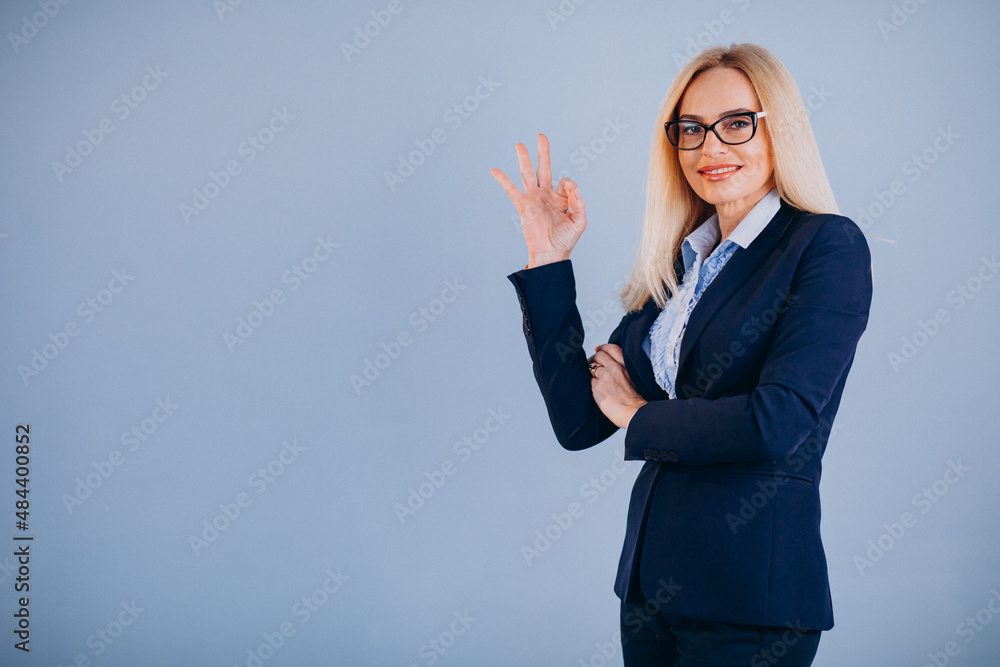 Mature business woman isolated in classy outfit Mature business woman isolated in classy outfit