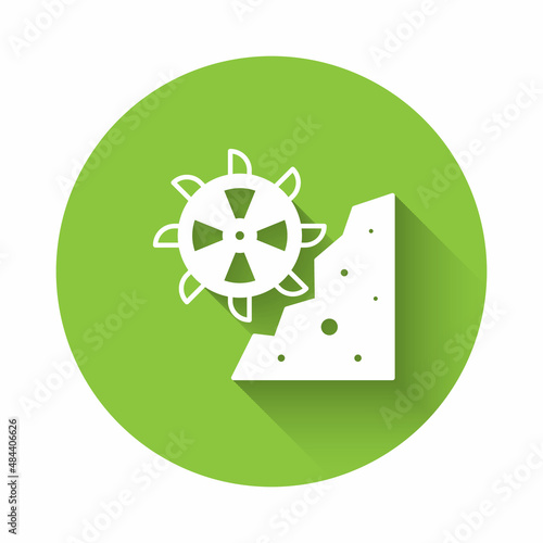White Bucket wheel excavator icon isolated with long shadow background. Green circle button. Vector