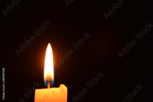 Candle light in darkness as light for life