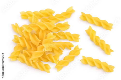 raw Fusilli pasta, isolated on white background with clipping path and full depth of field. Top view. Flat lay photo