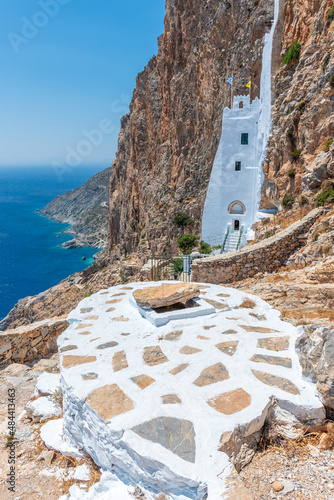 The famous Hozoviotissa Monastery standing on a rock over the Aegean sea in Amorgos island, Cyclades, Greece. photo