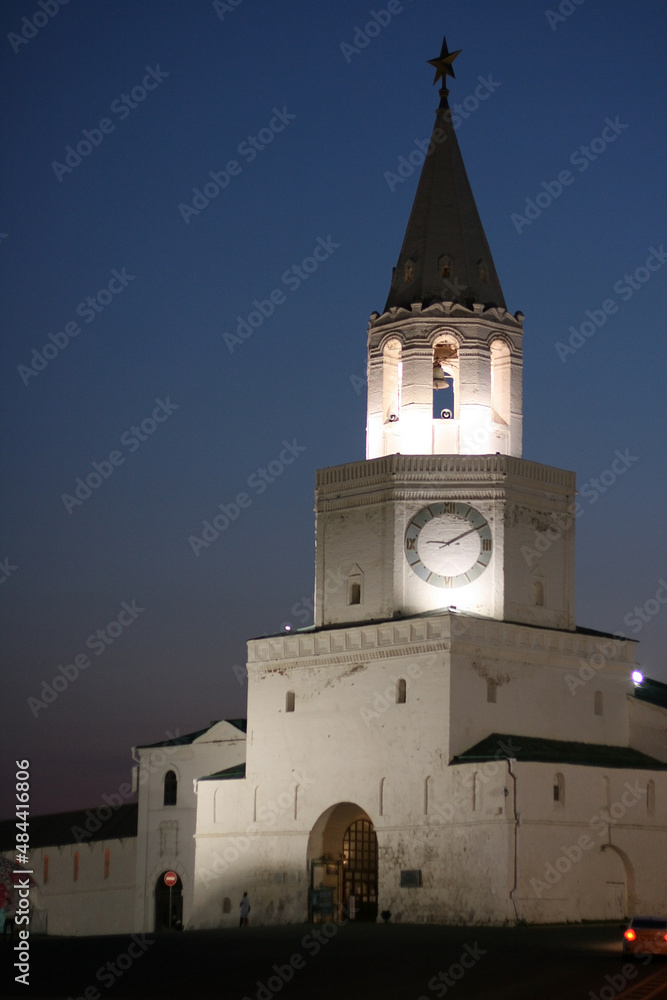 Fototapeta premium Kazan Kremlin in summer, Tatarstan, Russia - July 12 2021- It is top tourist attraction of Kazan. Scenic panorama of white fortress under blue sky. 