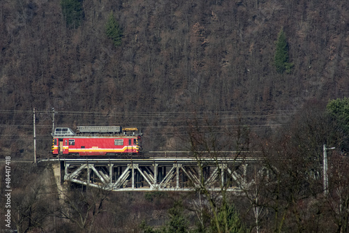 Maintenance locomotive crossing a bridge