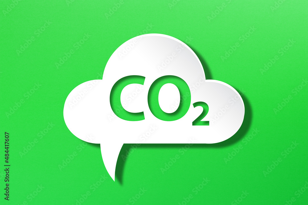 Obraz premium Carbon Emission icon with cloud shaped speech bubble on green background 
