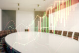 Abstract virtual financial graph hologram on a modern conference room background, forex and investment concept. Multiexposure